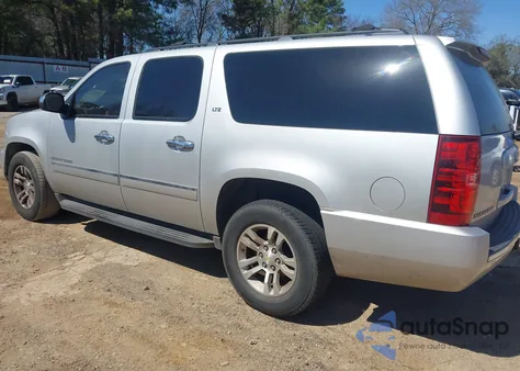 2011 Chevrolet Suburban 1500 Ltz z USA, uszkodzony, nr VIN 1GNSCKE04BR385153